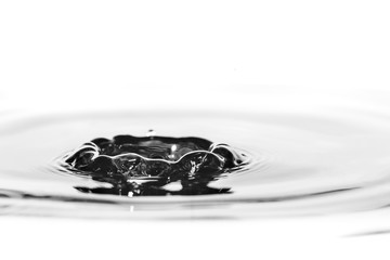 Water droplet splash background texture isolated on white. Fresh clean pure water ripples and...