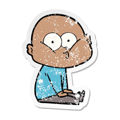 distressed sticker of a cartoon bald man staring