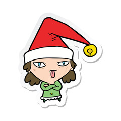 sticker of a cartoon girl wearing christmas hat