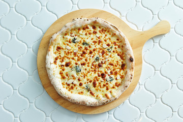 Cheese pizza with almond slice 