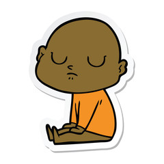 sticker of a cartoon bald man