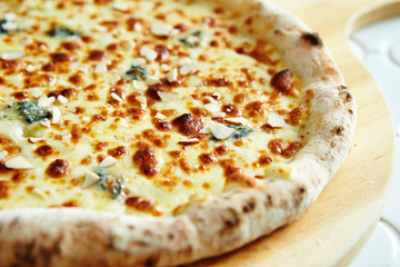 Cheese pizza with almond slice 