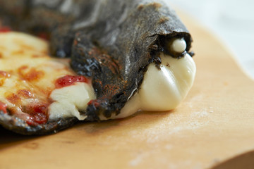 pizza with olives and cheese