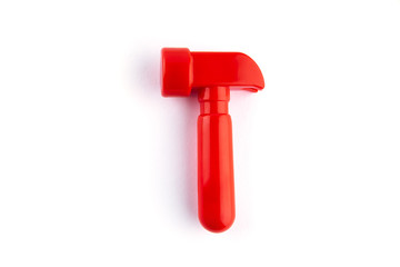 Toy red hammer isolated on white. Place for texs.