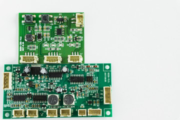 green transistor board on white background