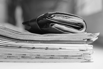 Newspapers and Wallet with Money. Stack of Magazines and Journals and Savings, Business and Finance...