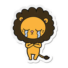 sticker of a crying cartoon lion