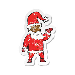 retro distressed sticker of a cartoon santa claus
