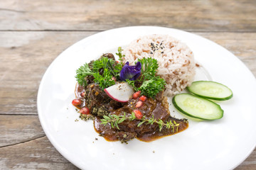 Rice and pork bake with rosemary