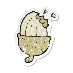 retro distressed sticker of a cartoon acorn