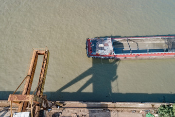 Cargo industrial port, port cranes. Loading of sand mine