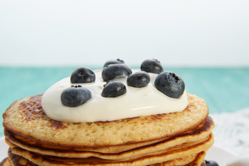 pancakes with fruit and maple syrup