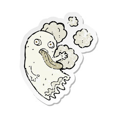 Fototapeta premium retro distressed sticker of a cartoon ghost