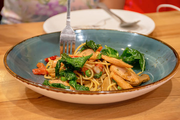 The spaghetti spicy shrimp and squid with vegetables