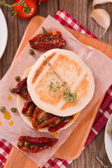 Tigella bread with sun-dried tomatoes.