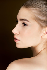 Portrait of young beautiful girl with natural makeup