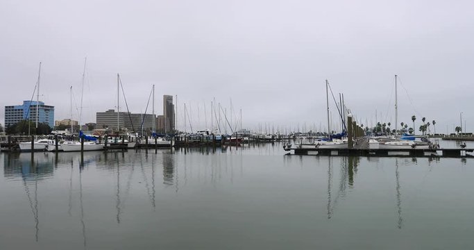 Corpus Christi harbor marina sailboats pan. South Texas tourism travel destination. Waterfront marina, port harbor and scenic byway.  Humid subtropical climate makes a year round vacation city.