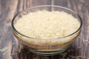 A glass bowl with white long-grain rice