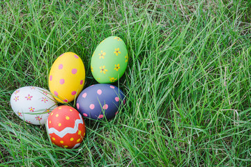 Beautiful Easter Multi color egg on garden
