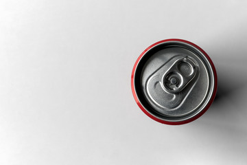 closeup metallic can on white table background. top view