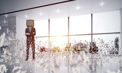 Businessman with an old TV instead of head.