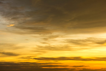 Beautiful golden sunshine reflect and spread with sky and dark cloud at asia