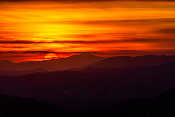Fototapeta na wymiar Beautiful sunset over mountains layers in Umbria (Italy)
