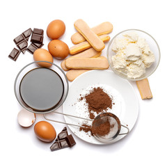 Ingredients for cooking tiramisu - Savoiardi biscuit cookies, mascarpone, cream, sugar, cocoa, coffee and egg