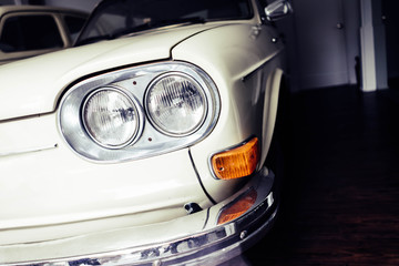 Old vintage cars that have been preserved in the garage for a long time.