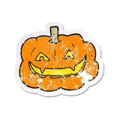 retro distressed sticker of a cartoon spooky pumpkin