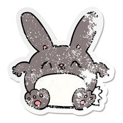 distressed sticker of a cartoon rabbit