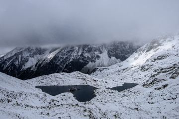 snow covered mountain tourist hiking trails