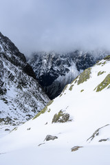 Fototapeta na wymiar snow covered mountain tourist hiking trails