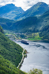 Obraz na płótnie Canvas Fjord Geirangerfjord with ferry boat, Norway.