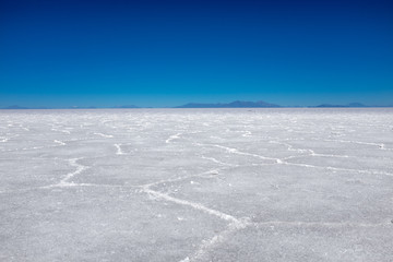 The amazing white vast landscape of the largest salt plain in the world at Salar De Uyuni (Salt Flat), Bolivia