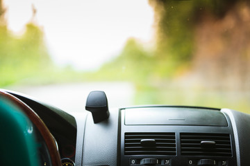 Car driving, view from inside on dashboard