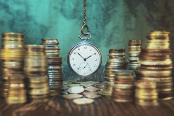 Time is money concept.Old coins and clock.Numismatics and collecting money.World currency.Silver,gold.Vintage and retro style.World map background.