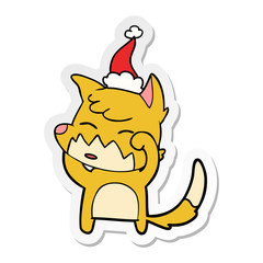 sticker cartoon of a fox wearing santa hat