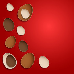 Abstract chocolate easter eggs on red background