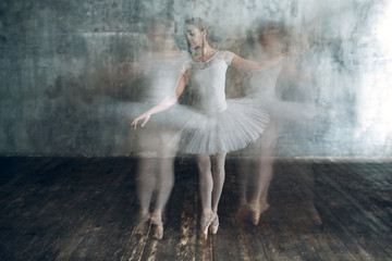 Ballerina female. Young beautiful woman ballet dancer, dressed in professional outfit, pointe shoes and white tutu. Multiple exposure. © primipil