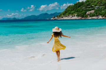 Fototapeta na wymiar woman relax on tropical beach resort with ocean view