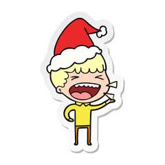sticker cartoon of a laughing man wearing santa hat
