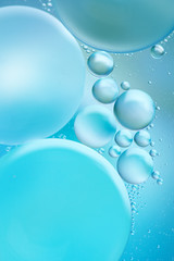 Blue colored abstract background with bubbles