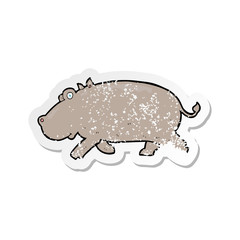retro distressed sticker of a cartoon hippopotamus