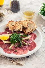Beef carpaccio with arugula and parmesan