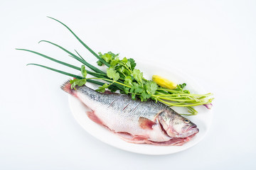Cleaning chopped fresh salmon and ingredients