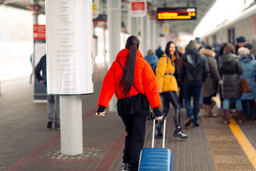 Young females take  the train.