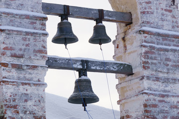 Three church bells in winter.