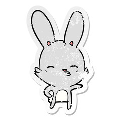 distressed sticker of a curious bunny cartoon