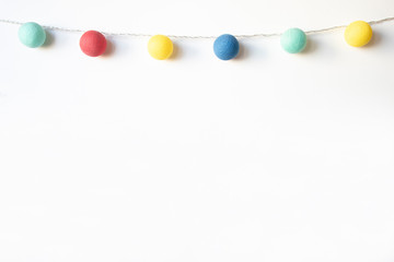Colorful decorative garland on white background.